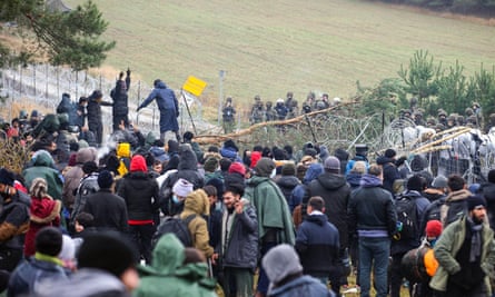 People gather on the Belarusian-Polish border