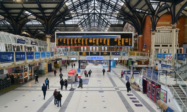 Commuters at Liverpool Street railway station on 15 January during the third London lockdown.