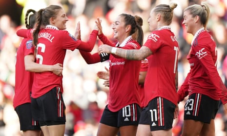 Manchester United’s Katie Zelem (centre) celebrates after opening the scoring