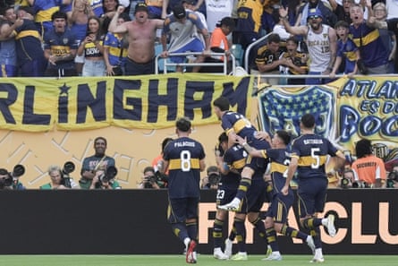 Boca players celebrate their opener, scored by Miguel Merentiel.
