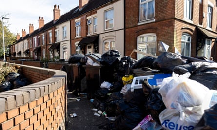 Piles of rubbish bags on a street in Birmingham