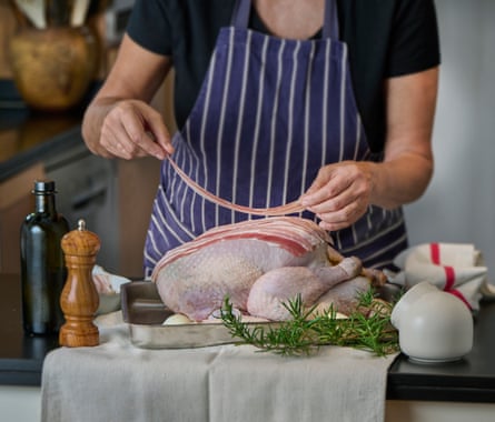 Turkey ready for the oven Photography: Jean Cazals Food Styling: Marie-Ange Lapierre Props Styling: Pene Parker Margot Henderson Christmas recipes Observer Food Monthly OFM November 2023