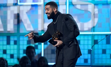 Drake accepts the award for best rap song.