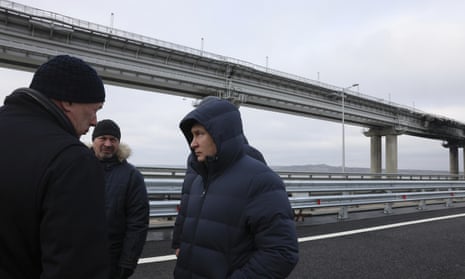 Russian President Vladimir Putin visits the bridge over the Kerch Strait which was damaged in October.