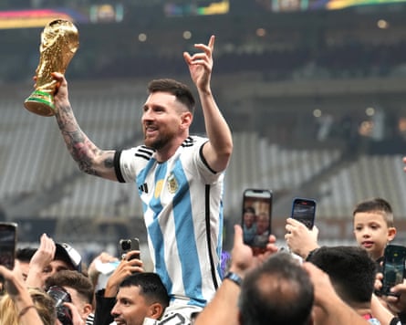 Lionel Messi pinch nan Fifa World Cup Trophy successful Qatar.