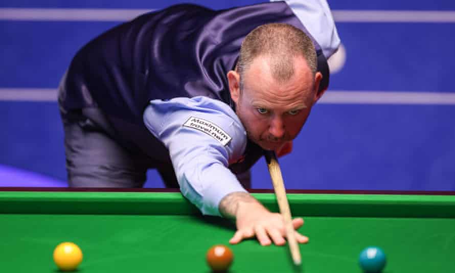 Mark Williams plays a shot during his win over Sam Craigie.
