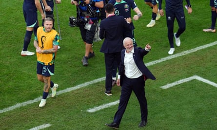 Australia manager Graham Arnold celebrates after the final whistle.