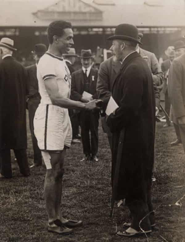 Edward is congratulated by King George V at the 1922 AAAs