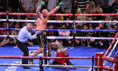 Tyson Fury celebrates his victory over Deontay Wilder in their heavyweight title fight