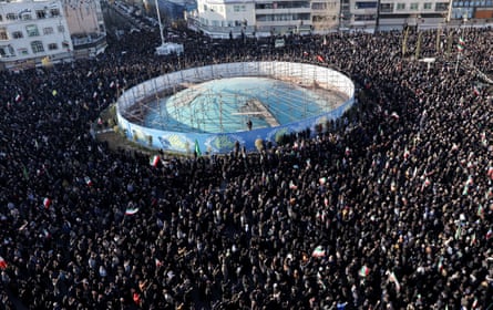 Aerial view of crowds of people gathered in the city