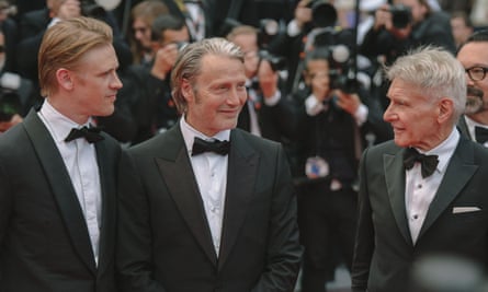 From left Boyd Holbrook, Mads Mikkelsen and Harrison Ford at the Cannes film festival for the premiere of Indiana Jones and the Dial of Destiny.