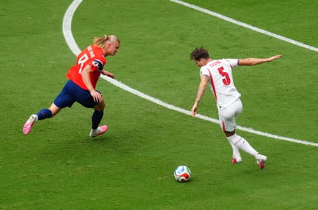 John Stones smartly reads the run of Erling Haaland to snuff out the danger.