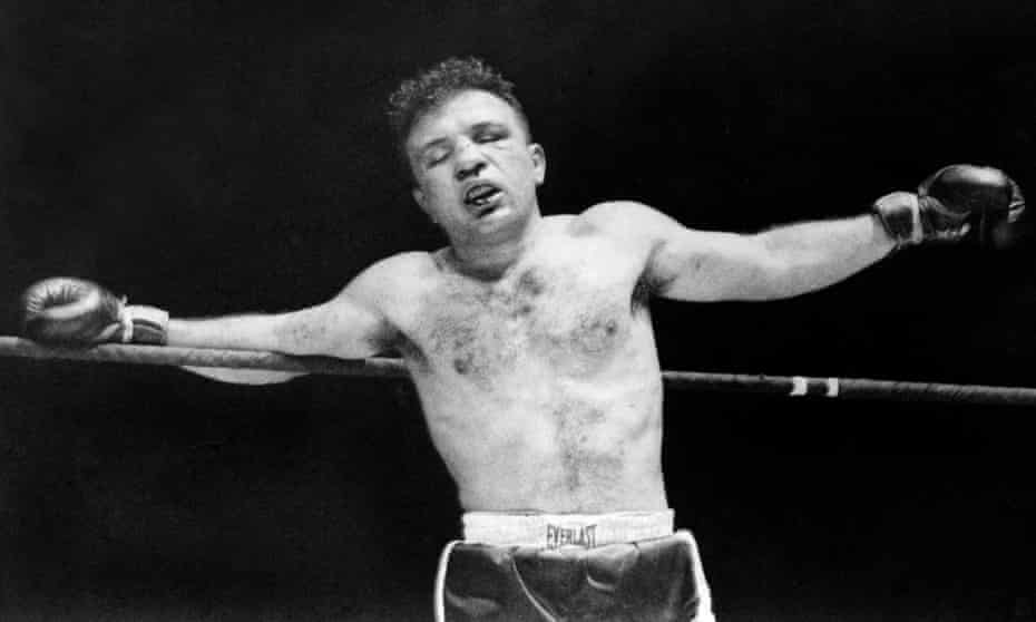 Jake ‘Raging Bull’ LaMotta in the 13th round of his final fight with Sugar Ray Robinson in 1951. 