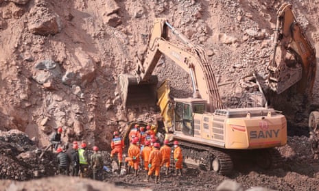 Rescuers at the site of the collapsed coalmine