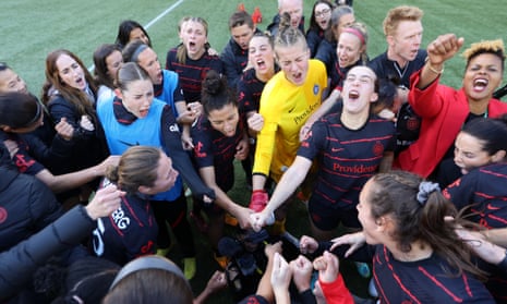 Portland Thorns players celebrate their win against San Diego Wave in the semi-final of the 2022 NWSL playoffs.