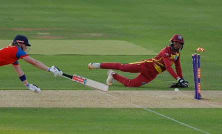 West Indies wicketkeeper Shermaine Campbelle breaks the stumps as Heather Knight dives