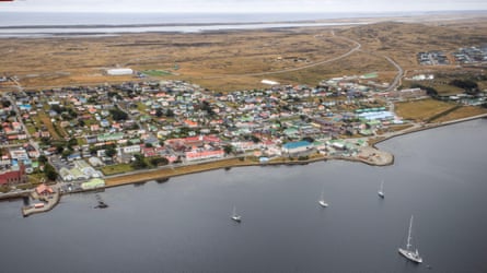 Aerial view of Stanley, a settlement beside the sea in a natural harbour