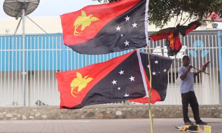 A street vendor sells flags in the PNG capital Port Moresby ahead of Independence Day celebrations as the country grapples with a polio outbreak.