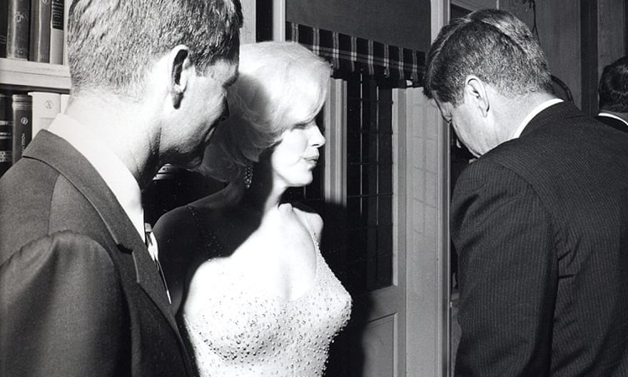 Monroe (in sequinned silver dress) with President John F Kennedy and his brother Robert, after JFK’s birthday party in 1962.