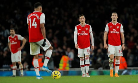 Arsenal’s Mesut Ozil and Granit Xhaka dejected after Brighton’s second goal.