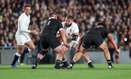 England’s Will Stuart (centre) takes on New Zealand at Eden Park.