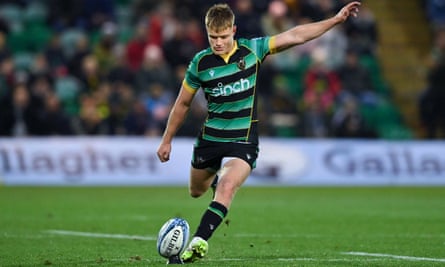 Fin Smith kicks for Northampton