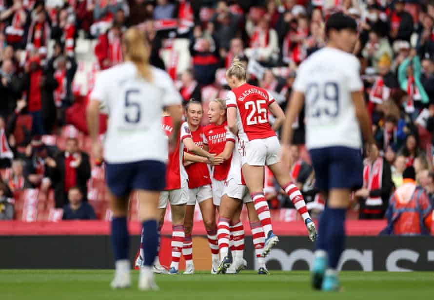 Arsenal’s Beth Mead (centre) is congratulated by her team-mates after opening the scoring.