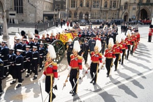 The coffin of the Queen is carried from Westminster Abbey
