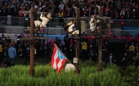 AMFOOT-SUPERBOWL-PATRIOTS-SEAHAWKS-HALFTIME-SHOWPuerto Rican singer Bad Bunny waves the flag of Puerto Rico as he performs during Super Bowl LX Patriots vs Seahawks Apple Music Halftime Show at Levi's Stadium in Santa Clara, California on February 8, 2026. (Photo by Patrick T. Fallon / AFP via Getty Images)