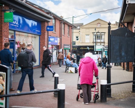 People walk on a pedestrianised high street