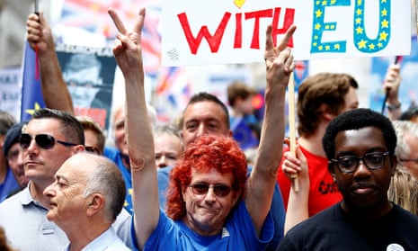 EU supporters, calling on the government to give Britons a vote on the final Brexit deal, take part in the People’s Vote march in central London.