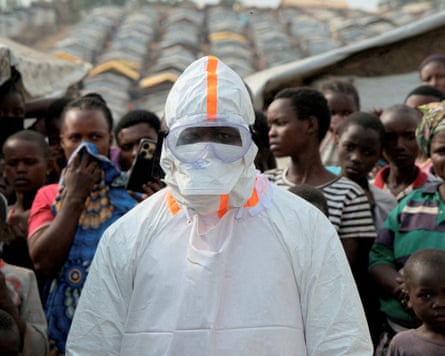 A health worker in personal protective equipment