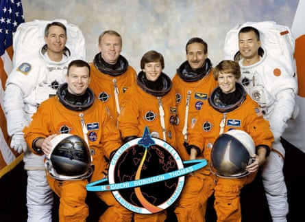 Andy Thomas (back row, second from left) with his crew mates as they prepare for a launch of the space shuttle Discovery in July 2005