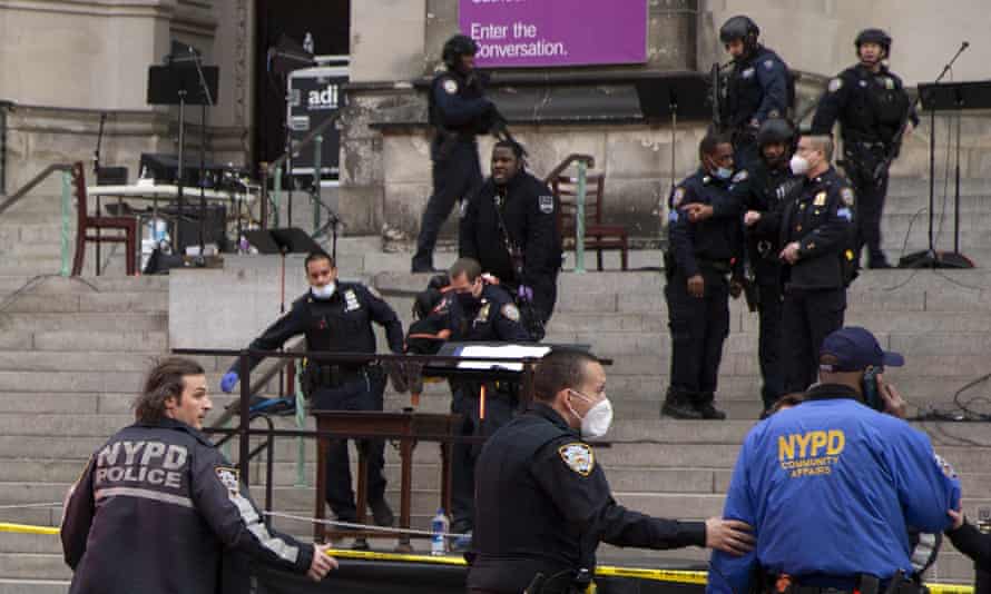A man was shot by police after shots rang out at the end of a Christmas choral concert on the steps of the Manhattan cathedral Sunday afternoon.