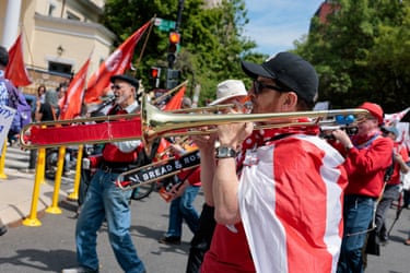 a person plays the trombone