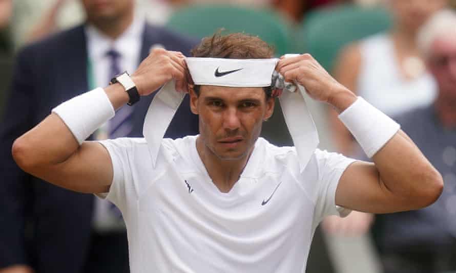 Rafael Nadal putting on headband