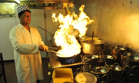 A curry chef in action in Brick Lane, east London.