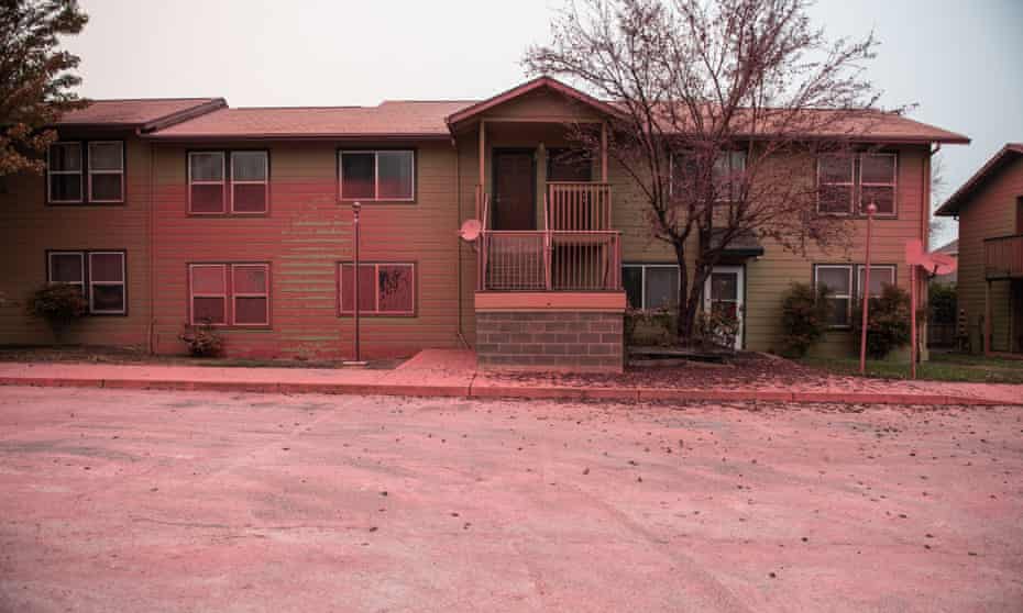 Almeda Fire Aftermath, Talent, Oregon, USA - 17 Sep 2020<br>Mandatory Credit: Photo by Chris Tuite/ImageSPACE/REX/Shutterstock (10781213ar) A general view of the Anderson Vista Apartments which were sprayed with fire retardent during the Almeda Fire. The town of Talent, Oregon, showing the burned out homes, cars and rubble left behind. In Talent, about 20 miles north of the California border, homes were charred beyond recognition. Across the western US, at least 87 wildfires are burning, according to the National Interagency Fire Center. They’ve torched more than 4.7 million acres -- more than six times the area of Rhode Island. Almeda Fire Aftermath, Talent, Oregon, USA - 17 Sep 2020