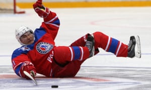 Russian President Vladimir Putin takes a tumble during ice hockey match in Sochi.