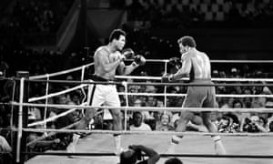 Ali, left, takes on George Foreman in Kinshasa, Zaire, in 1974.