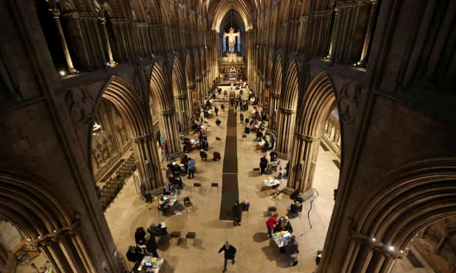 People receive Covid-19 vaccines inside Lichfield Cathedral, which has been turned into an emergency vaccination centre.