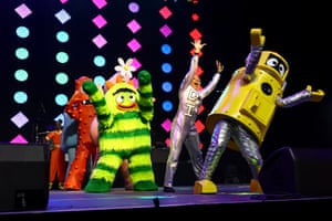 People in cartoonish costumes on stage