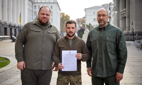 Ukraine's President Zelenskiy, Prime Minister Shmyhal and Parliament Speaker Stefanchuk hold a request for fast-track membership of the NATO military alliance, in Kyiv