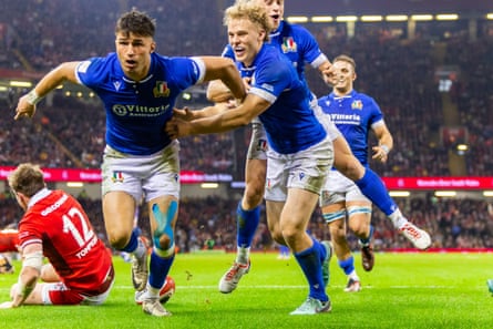 Italy celebrate scoring a try in the win over Wales.