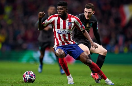 Thomas Partey in action against Liverpool’s Andy Robertson in the Champions League last-16 first leg. 