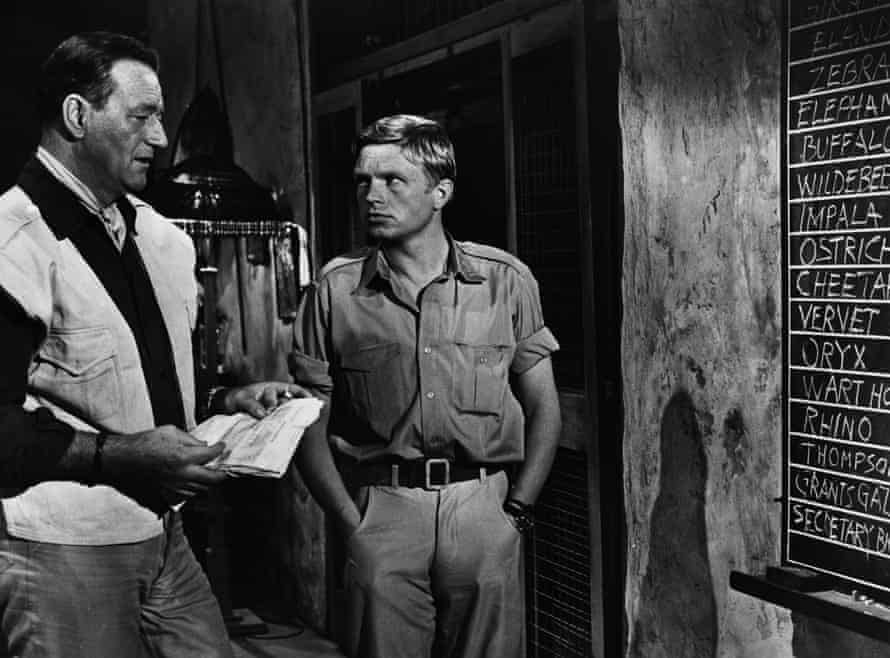 Hardy Krüger, right, with John Wayne in Howard Hawks’s Hatari!, 1962.