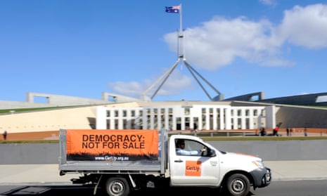 A ute is driven around Parliament House in 2009, by lobby group GetUp, which was calling for changes to the way donations are made to political parties.