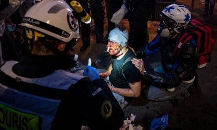 Medics tend to Syrian photographer Ameer al-Halbi