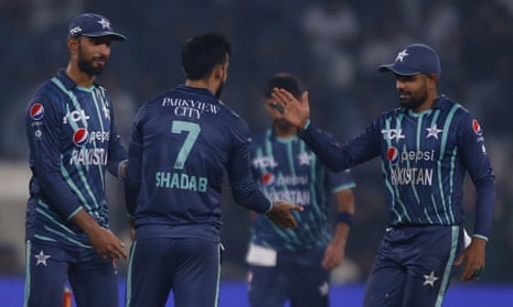 Pakistan's Shadab Khan (centre) celebrates with teammates after the dismissal of England's Dawid Malan.