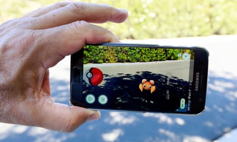 A Pokémon appears on the pavement using the augmented reality of Pokémon Go.